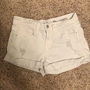 White jean shorts w/ rips